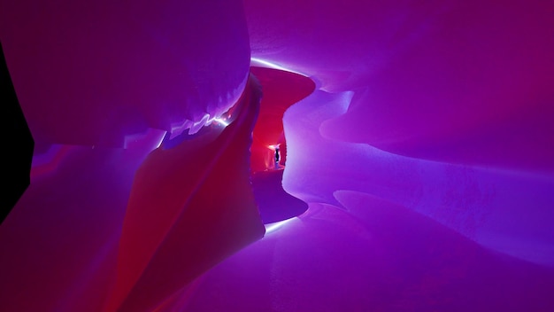 Uma Ilustração 3d Surreal De Um Túnel Iluminado Por Neon, Apresentando Cores Vibrantes E Padrões Intrincados, Ambientada Em Um Estilo Futurista.